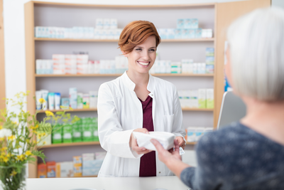 pharmacist helping patient